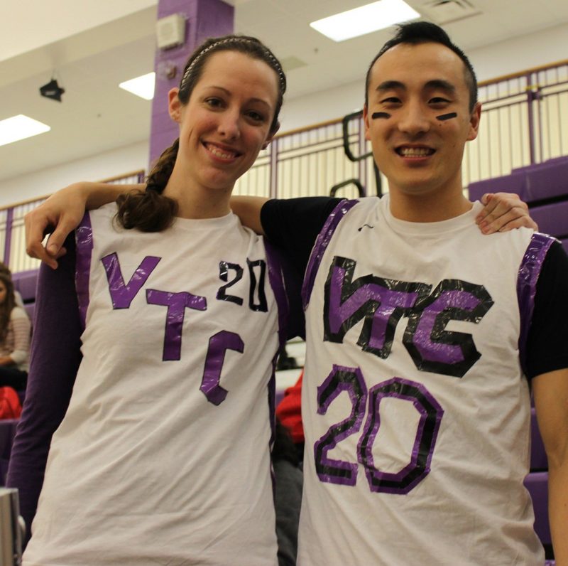 Katherine Somers and Eric Kim, both with war paint on their faces
