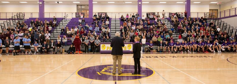 Dan and Gil Harrington speak to the crowd during the 4th annual "Docs for Morgan" basketball game.