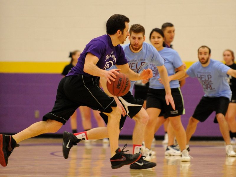 A player drives to the basket during the 4th annual "Docs for Morgan" basketball game.