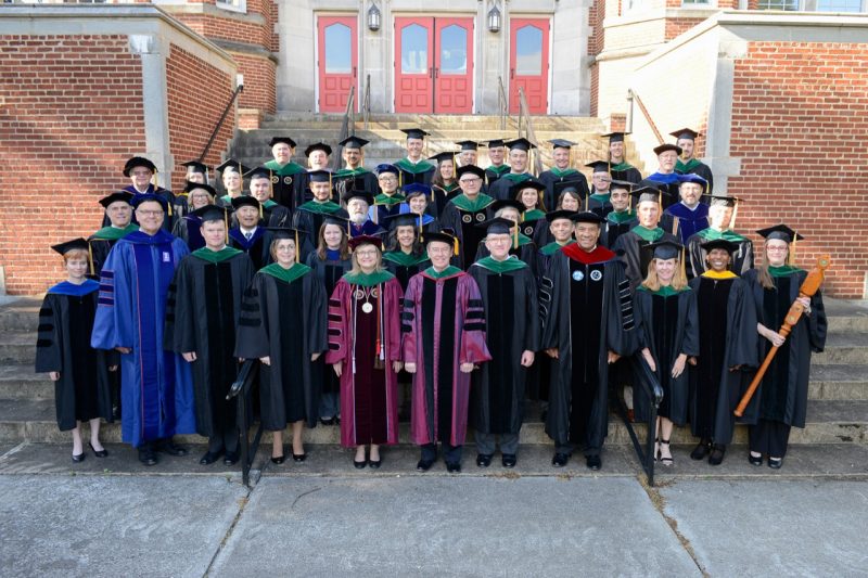 Deans, faculty members, and invited guests of the Virginia Tech Carilion School of Medicine pose for a group photo before commencement exercises on Saturday, May 7, 2016.