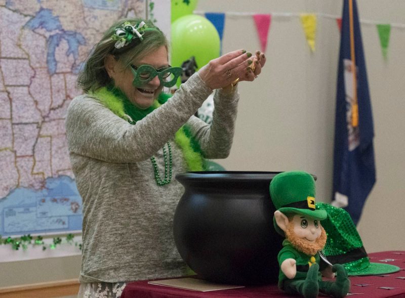 In observance of sharing St. Patrick's Day with Match Day, Dean Cynda Johnson dresses as a leprechaun with a pot of gold during Match Day celebrations.
