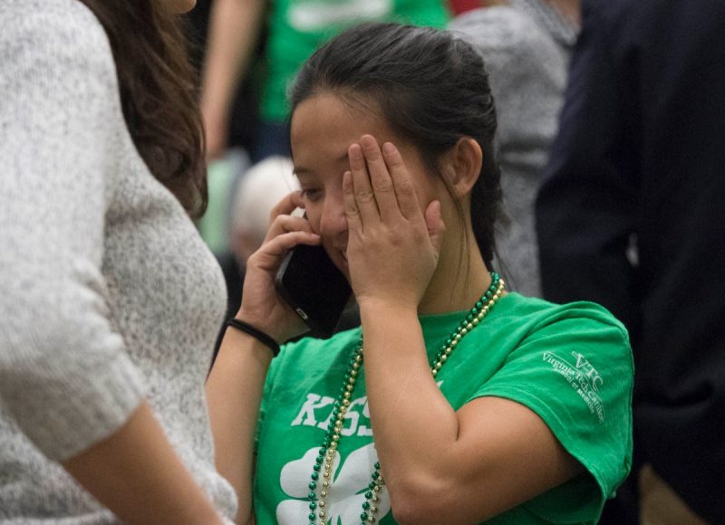 Fourth-year medical student Aiwen Liu calls family with the news