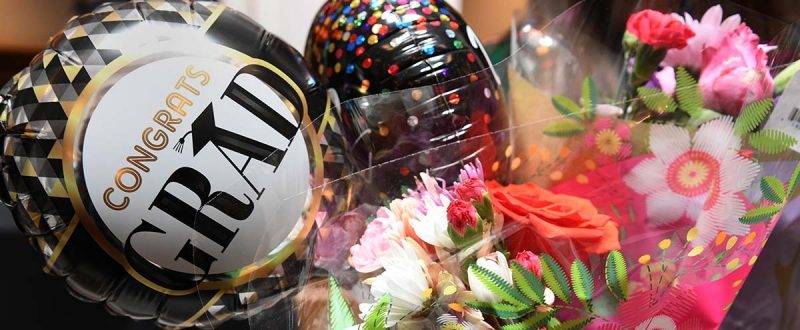 Graduation balloon and flowers