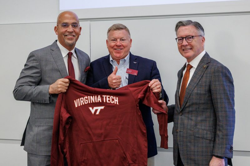 (From left) New head football coach James Franklin, Board of Visitors member J. Pearson, and Virginia Tech President Tim Sands
