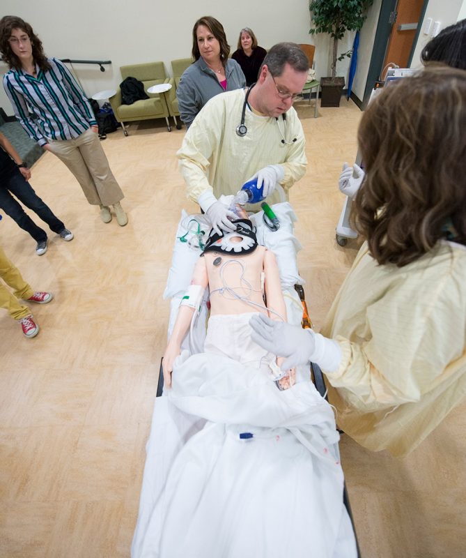 Educators at the Virginia Tech Carilion School of Medicine demonstrate a trauma situation on a fake patient