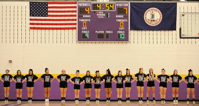 Cheerleaders from Roanoke's Cave Spring High School line up