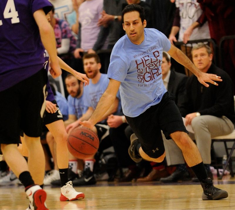 First year medical student Nimi Vahidi drives the baseline during the 4th annual "Docs for Morgan" basketball game.
