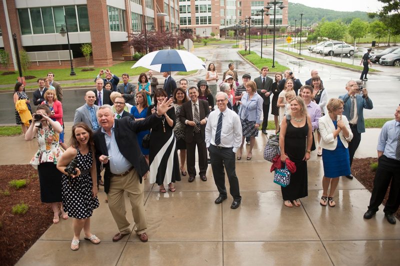 Friends and family gather outside the Virginia Tech Carilion School of Medicine