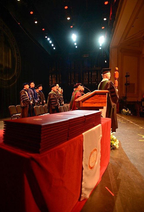 Diplomas for 40 brand new doctors await their recipients.