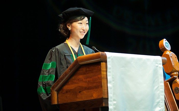 Graduating student Sanghee Suh, speaks at graduation
