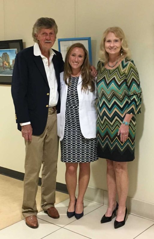 Lindsey Dove and parents at White Coat